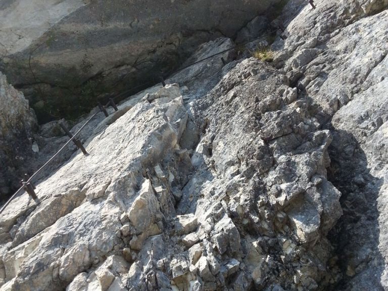 Climbing at well secured via ferrata in Salzburg