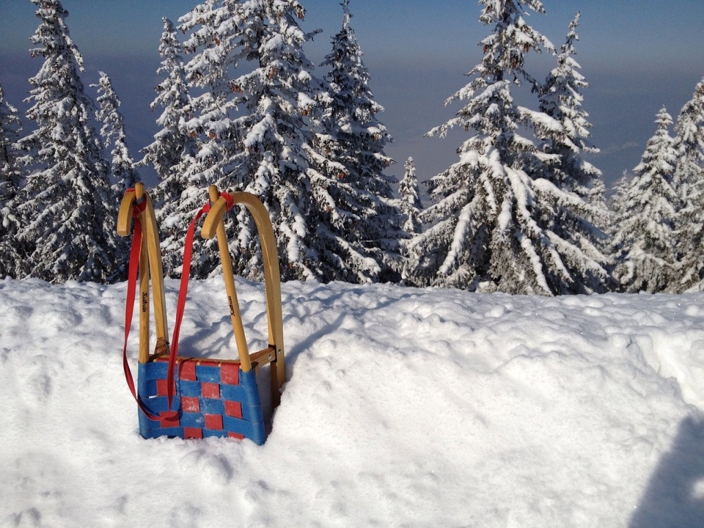 Schlittenfahren im Winterurlaub im Salzburger Land